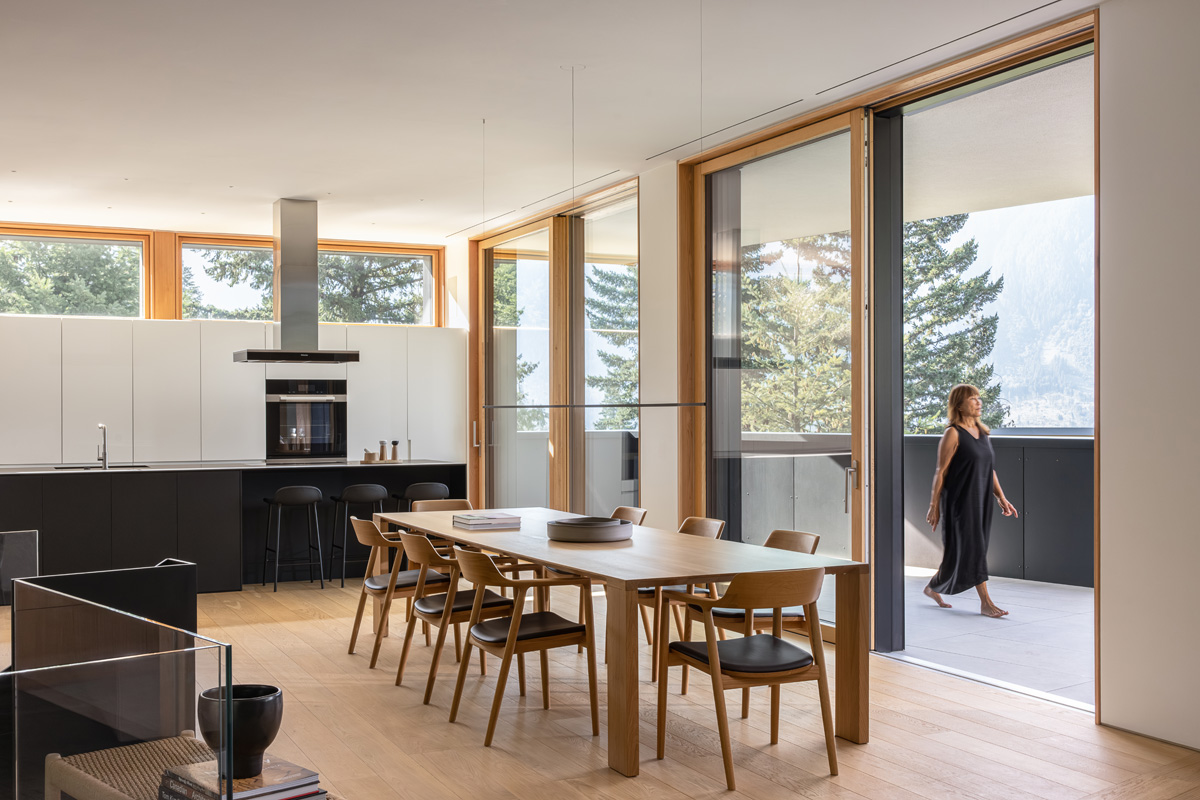 kitchen with generous sliding door opening up to pemberton valley views beyond